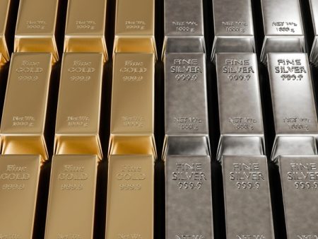 Gold and silver trade near record high levels.